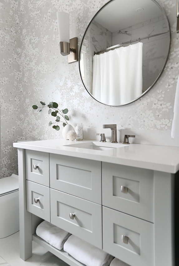 Simply-Home-Decorating_Lori-Steeves_Vancouver-BC_Canadian-Designer_What-You-Need-to-Know-About-Designing-a-Home-that-Helps-You-Destress_Modern-Bathroom-Vanity-with-Round-Mirror