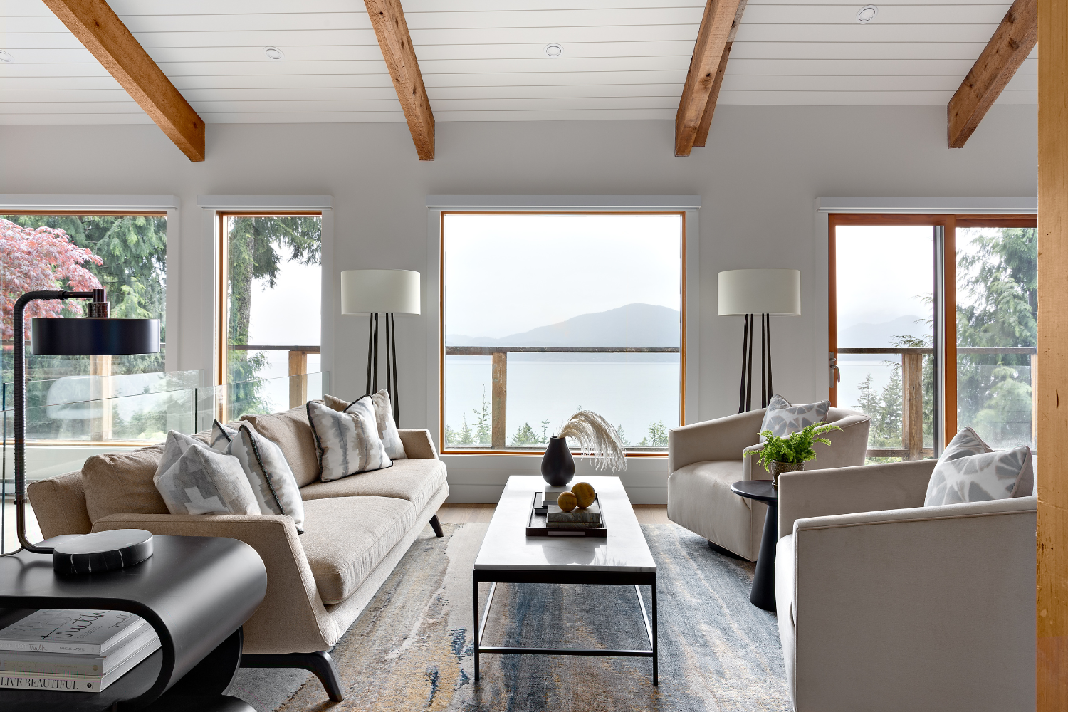 simply-home-decorating-blueridge-bc-ca-why-you-should-renovate-your-mid-century-home-living-room-with-bay-views-large-windows-nature-inspired-home-fresh-interior-design