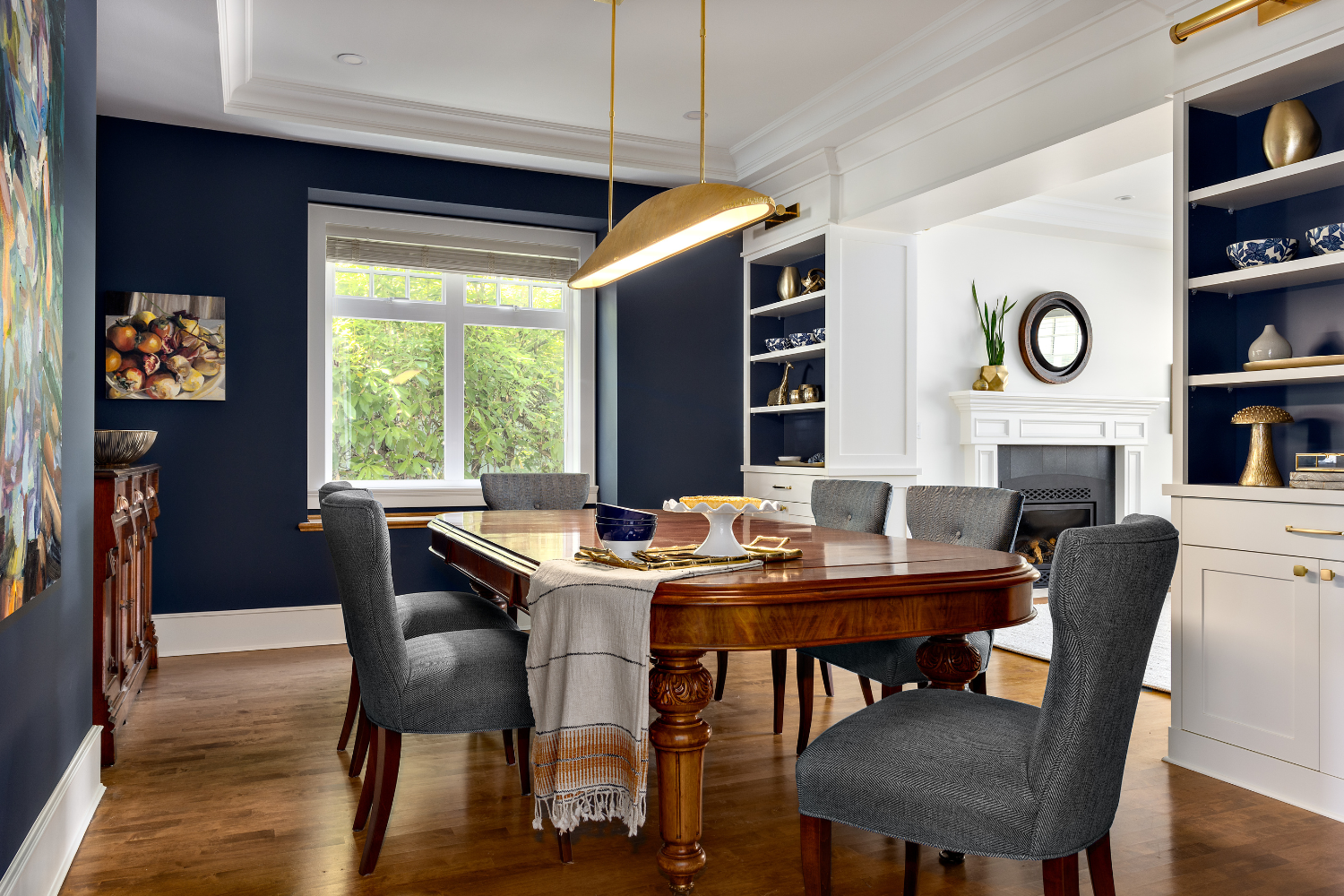 simply-home-decorating-north-vancouver-bc-ca-bold-dramatic-dining-room-dark-blue-walls-antique-table-modern-accessories-contemporary-interior-design