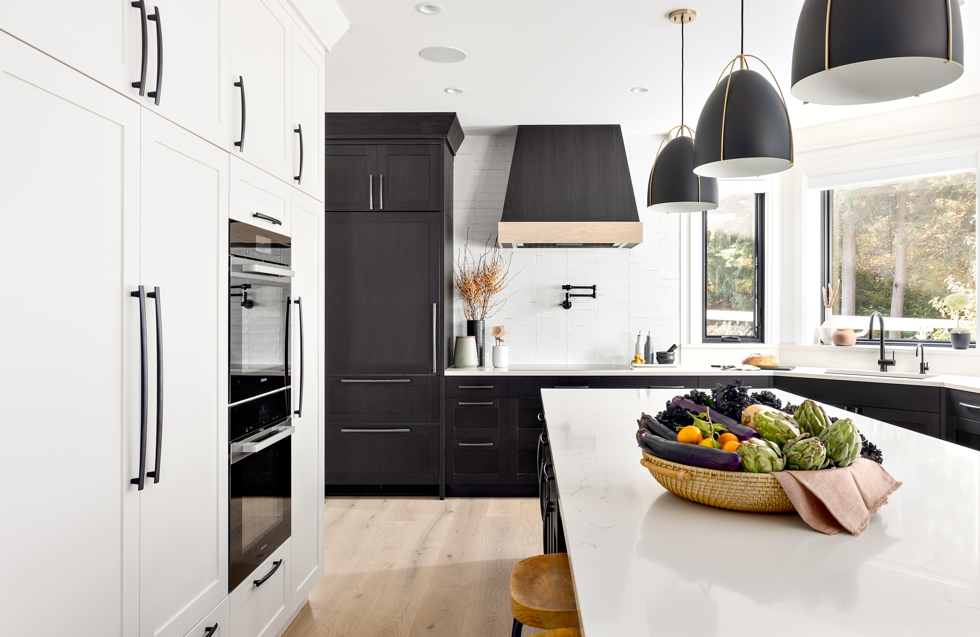 Simply Home-larkhall-north-vancouver-kitchen-corner-sink-modern-white-millwork-black-double oven-hood