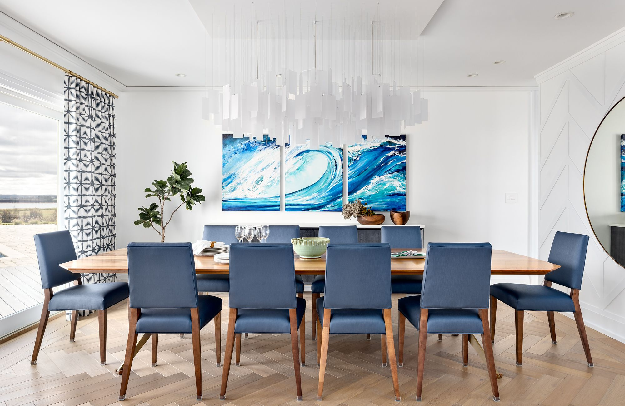 simply-home-decorating-island-home-design-east-coast-meets-west-coast-modern-large-dining-room-white-oak-floor-navy-blue-chairs