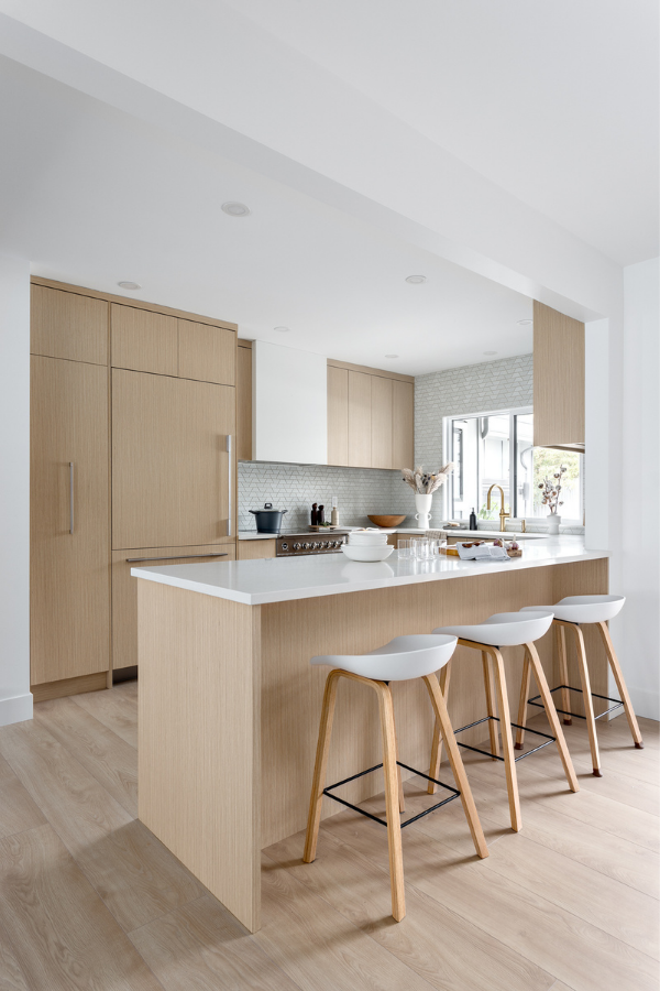 simply-home-decorating-blueridge-vancouver-bc-home-reveal-mid-century-renovation-pristine-bright-kitchen-oak-cabinets-white-barstools-clean-lines-elevated-interior-design