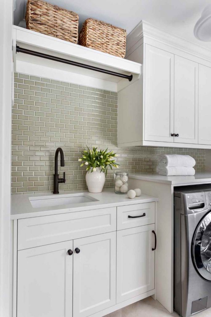 simply-home-decorating-newfoundland-project-personal-spaces-rooted-in-intention-sage-tile-custom-cabinetry-elevated-laundry-room