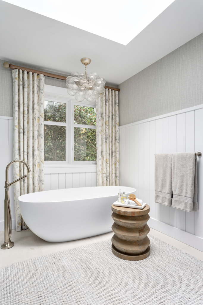 Coastal bathroom design freestanding tub gray wallpaper statement lighting soothing home decor simply home decorating