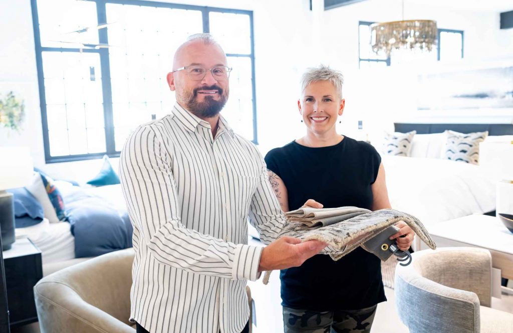 simply-home-decorating-deep-cove-bc-interior-design-investment-lori-steeves-with-trade-partner-holding-fabric-modern-home-furnishings