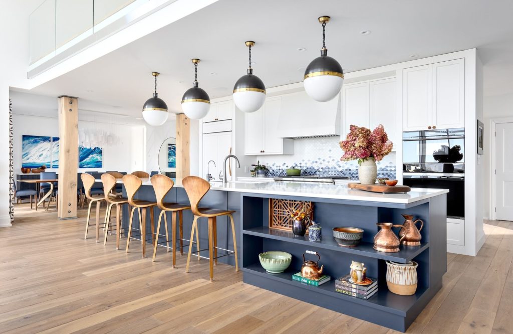 full-service-interior-design-edgemont-vancouver-kitchen-design-everyday-living-large-island-with-seating-and-built-in-shelves-blue-and-white-refined-renovation