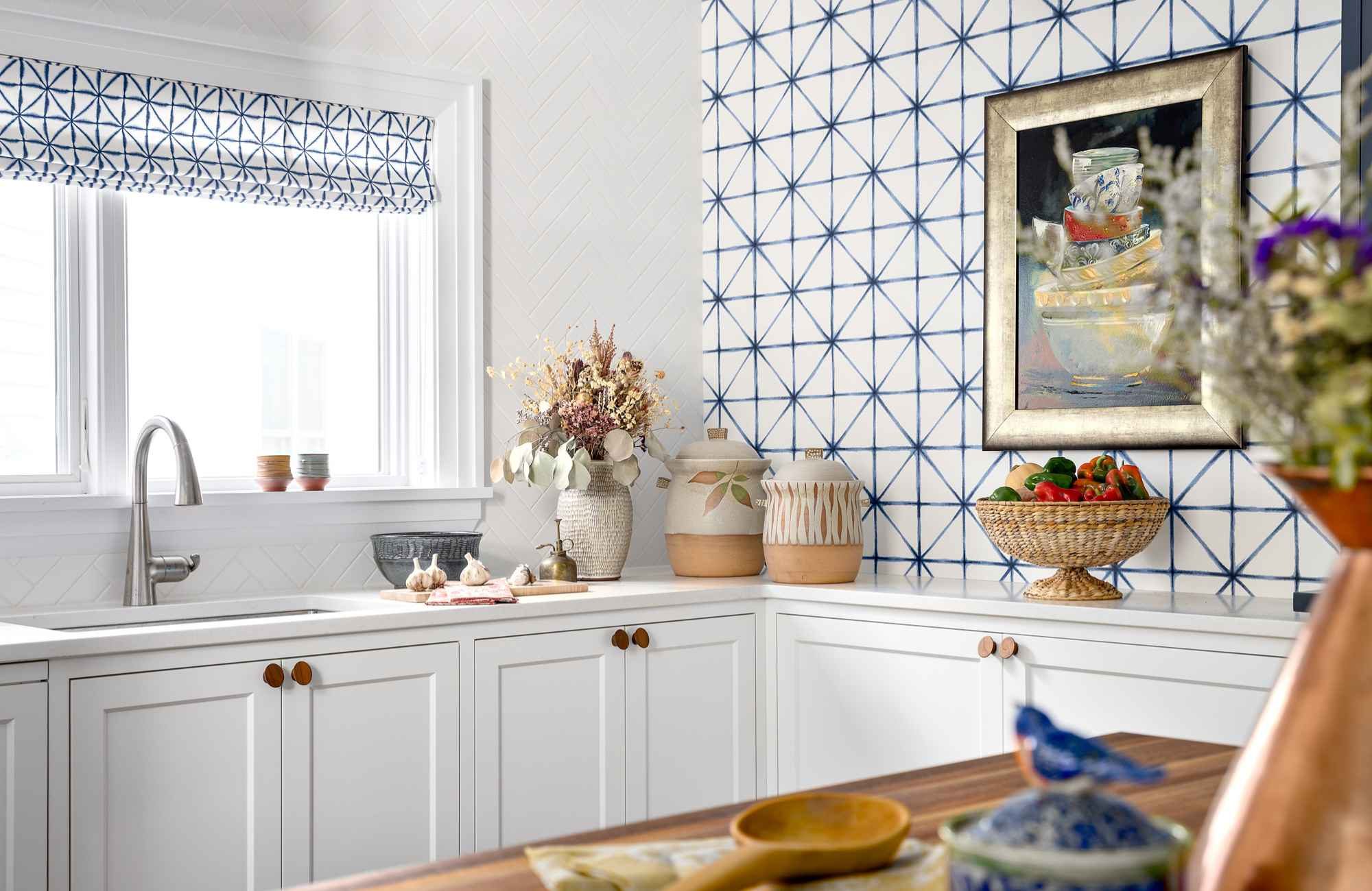 Simply-home-decorating-north-vancouver-bc-incorporating-artwork-into-your-home-light-bright-kitchen-playful-white-and-blue-backsplash-tile-contemporary-interior-design