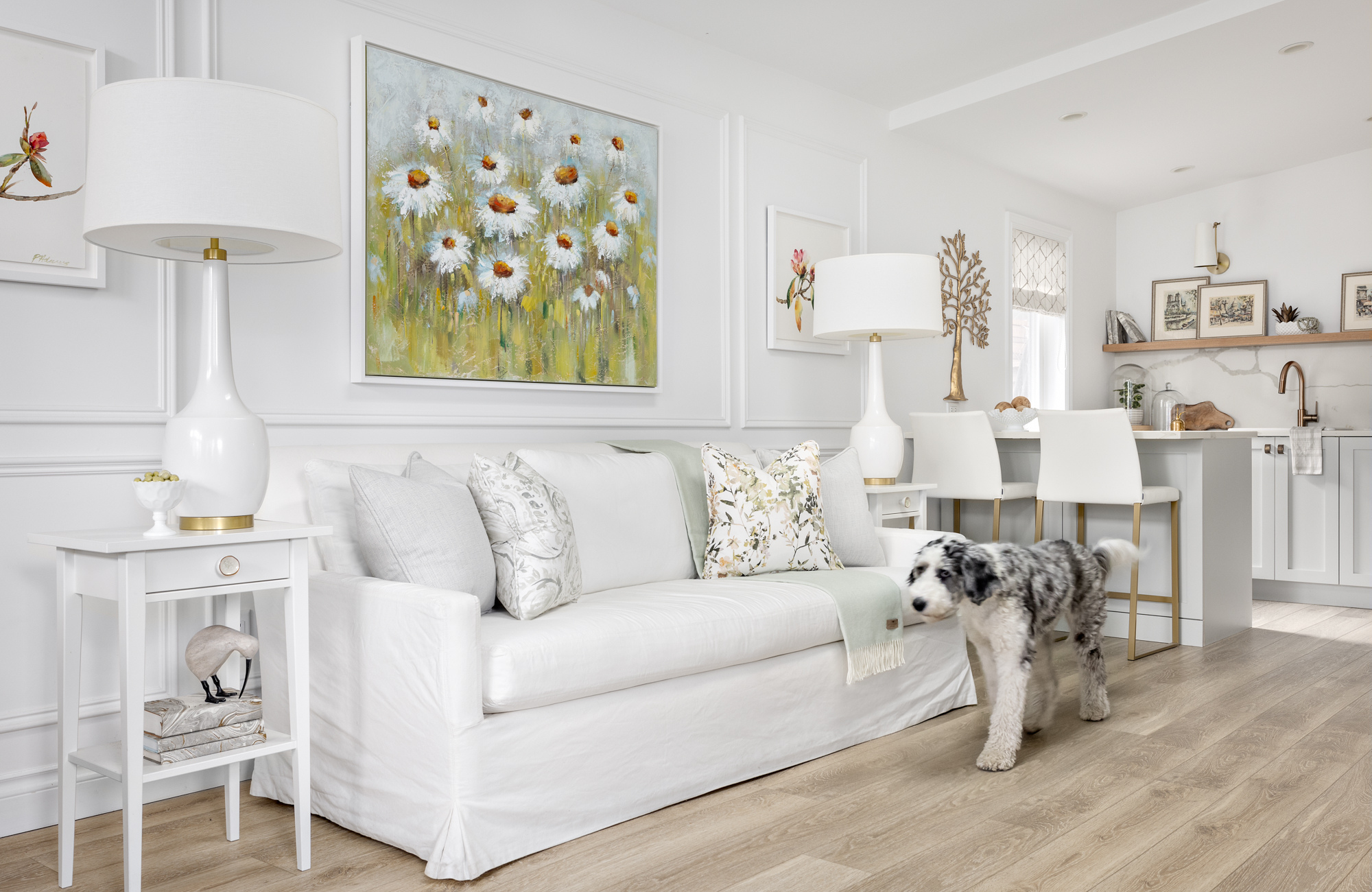 home-office-oak-flooring-white-sofa-colourful-artwork-living-with-pets